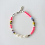 Stylisches Perlenarmband "Amy" Süsswasserperlen mit afrikanischem und böhmischem Glas Silber Neon Pink