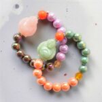 Buddha Armband mit bauchigem Buddha in Rosa – Bild 2